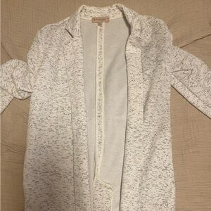 White drapey cardigan sweater with heathered grey/white print